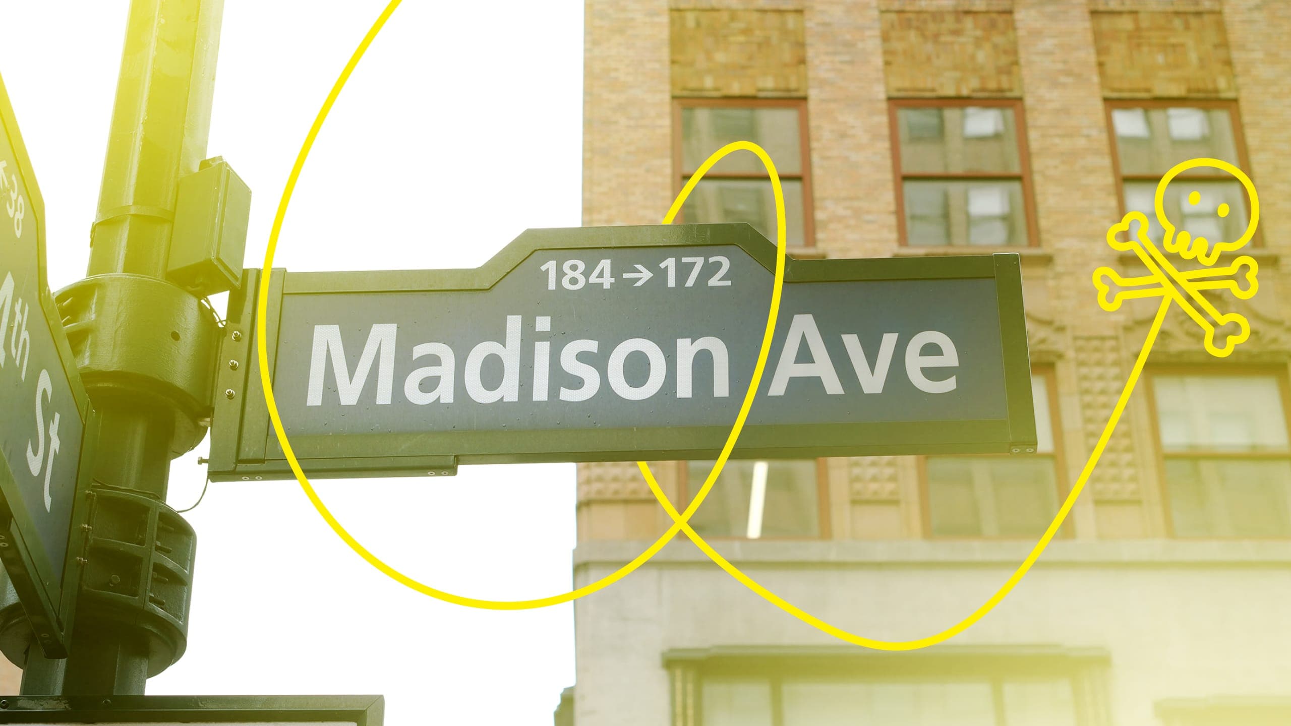 A street sign for "Madison Ave" in New York city. A yellow illustrated line loops around it with a skull and cross bones connected to it.