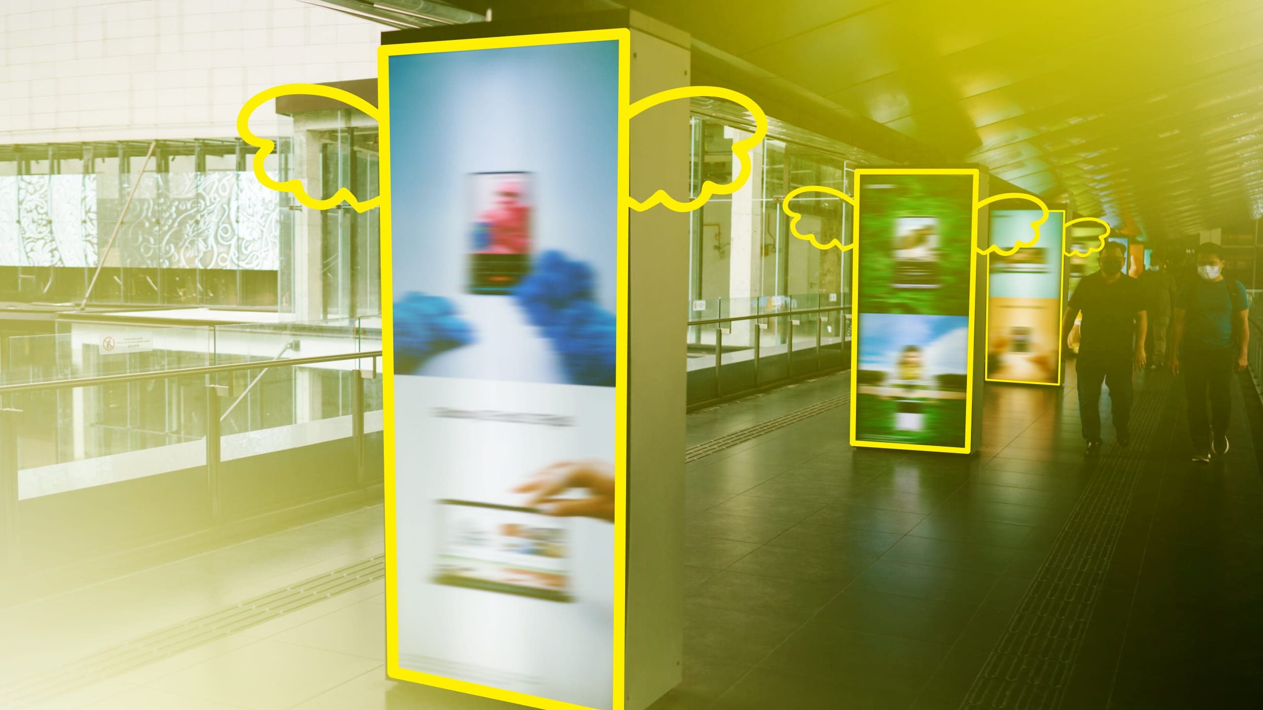 Out-of-home media displays with angel wings illustrated on them